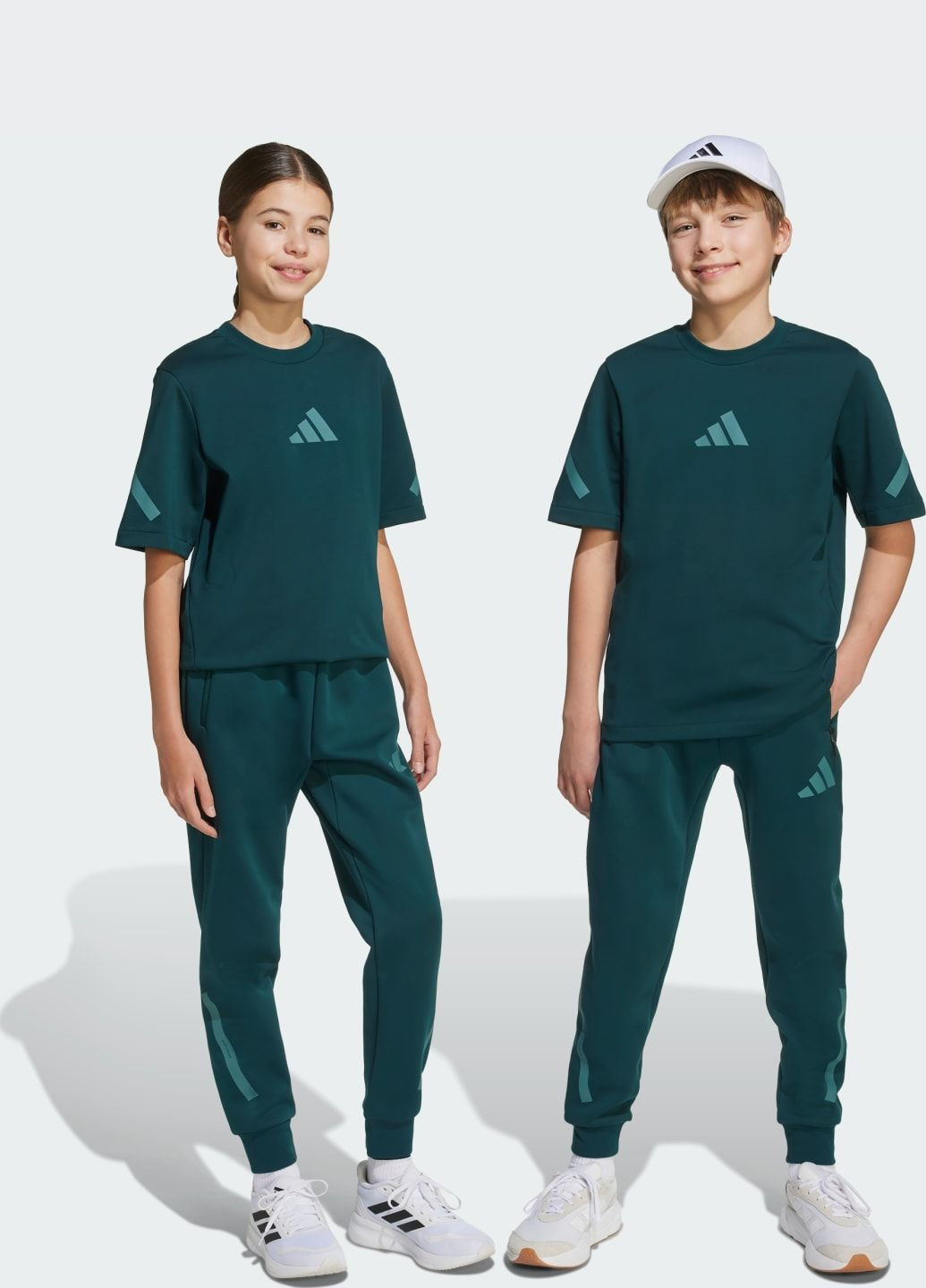 Зеленые спортивные демисезонные брюки adidas