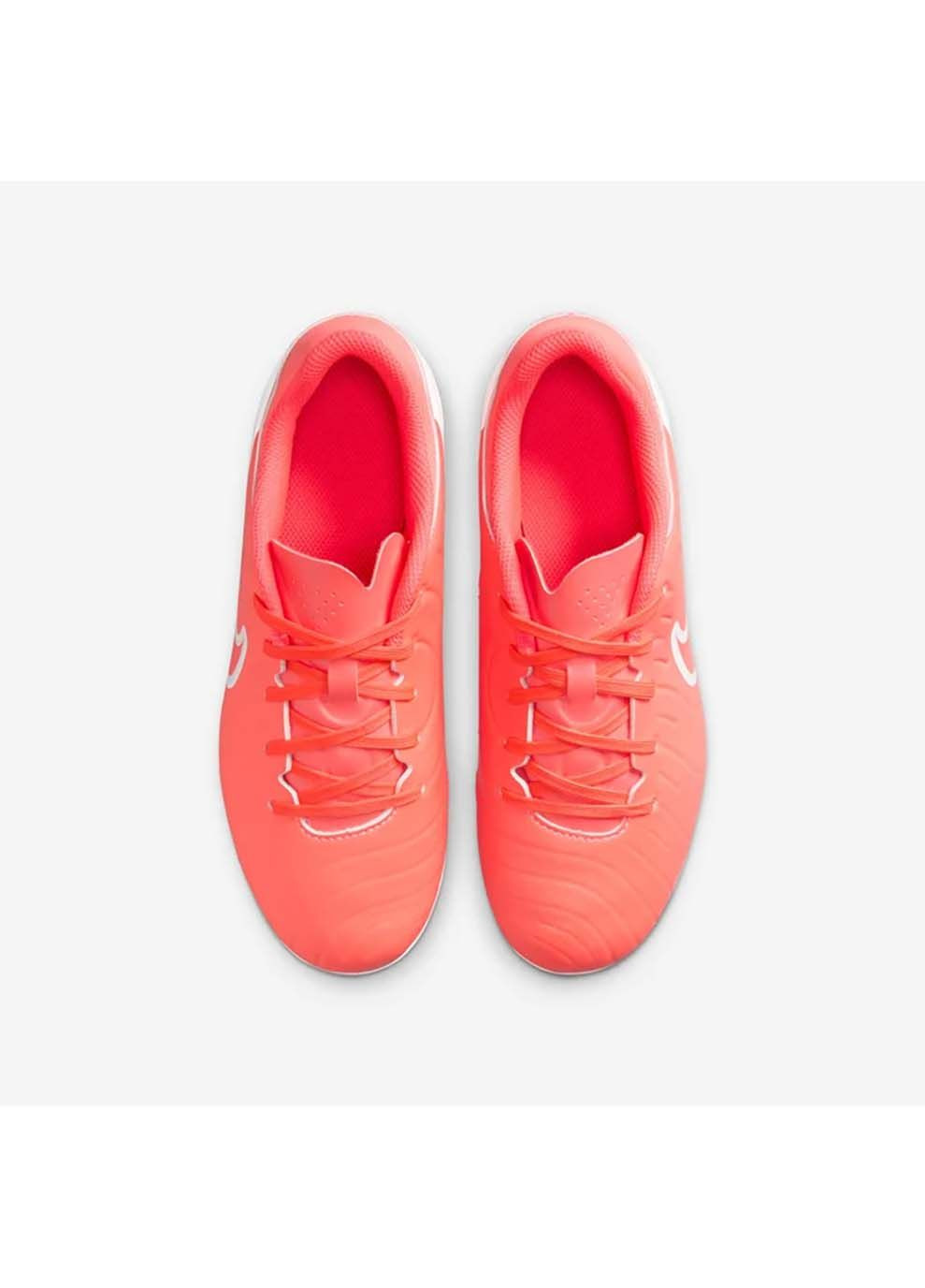 Коралловые детские бутсы jr legend 10 academy fg/mg коралловый Nike