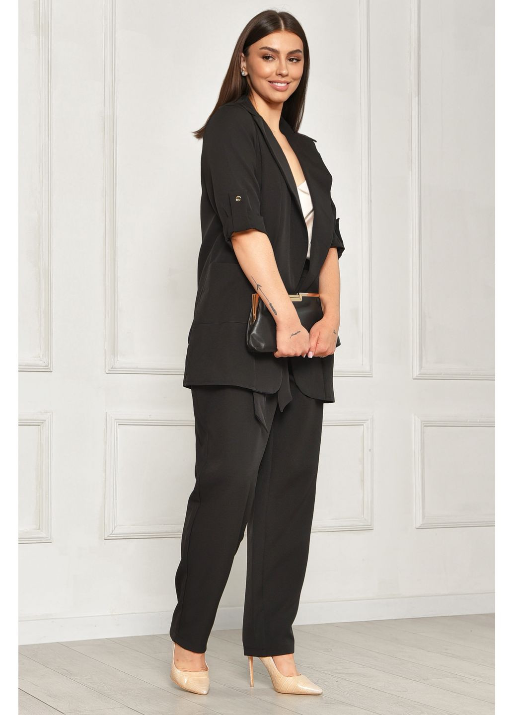 Костюм жіночий однотонний чорного кольору Let's Shop (348781830)