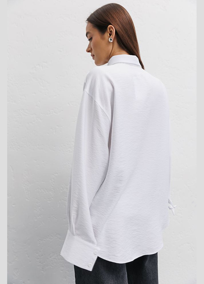 Жіноча біла сорочка оверсайз з лаштунками на рукавах Arjen (289842168)