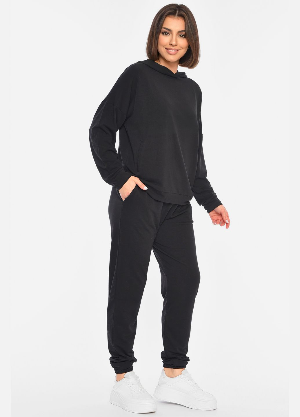 Спортивний костюм жіночий батальний чорного кольору однотонний Let's Shop (305572985)