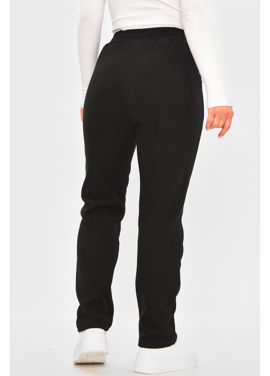 Штани жіночі однотонні на штучному хутрі чорного кольору Let's Shop (364485099)