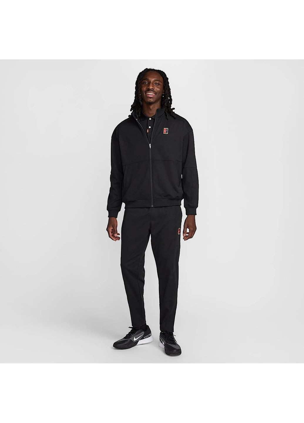 Черные демисезонные брюки Nike