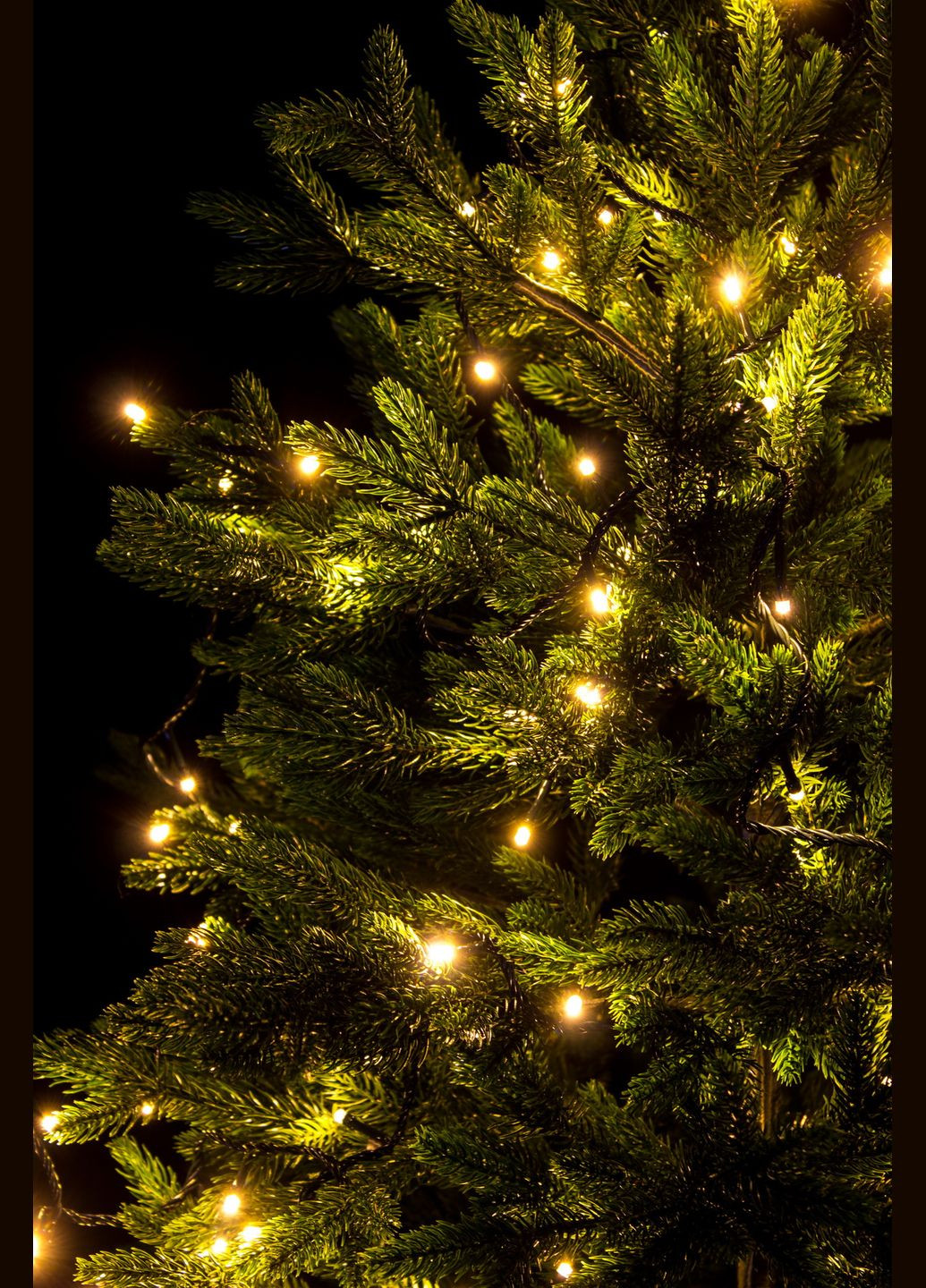 Гірлянда світлодіодна нитка 7 метрів на ялинку Тепло-біла 100 лампочок новорічна від мережі чорний провід (ww.01.5B.100-) Laplandia (314893359)