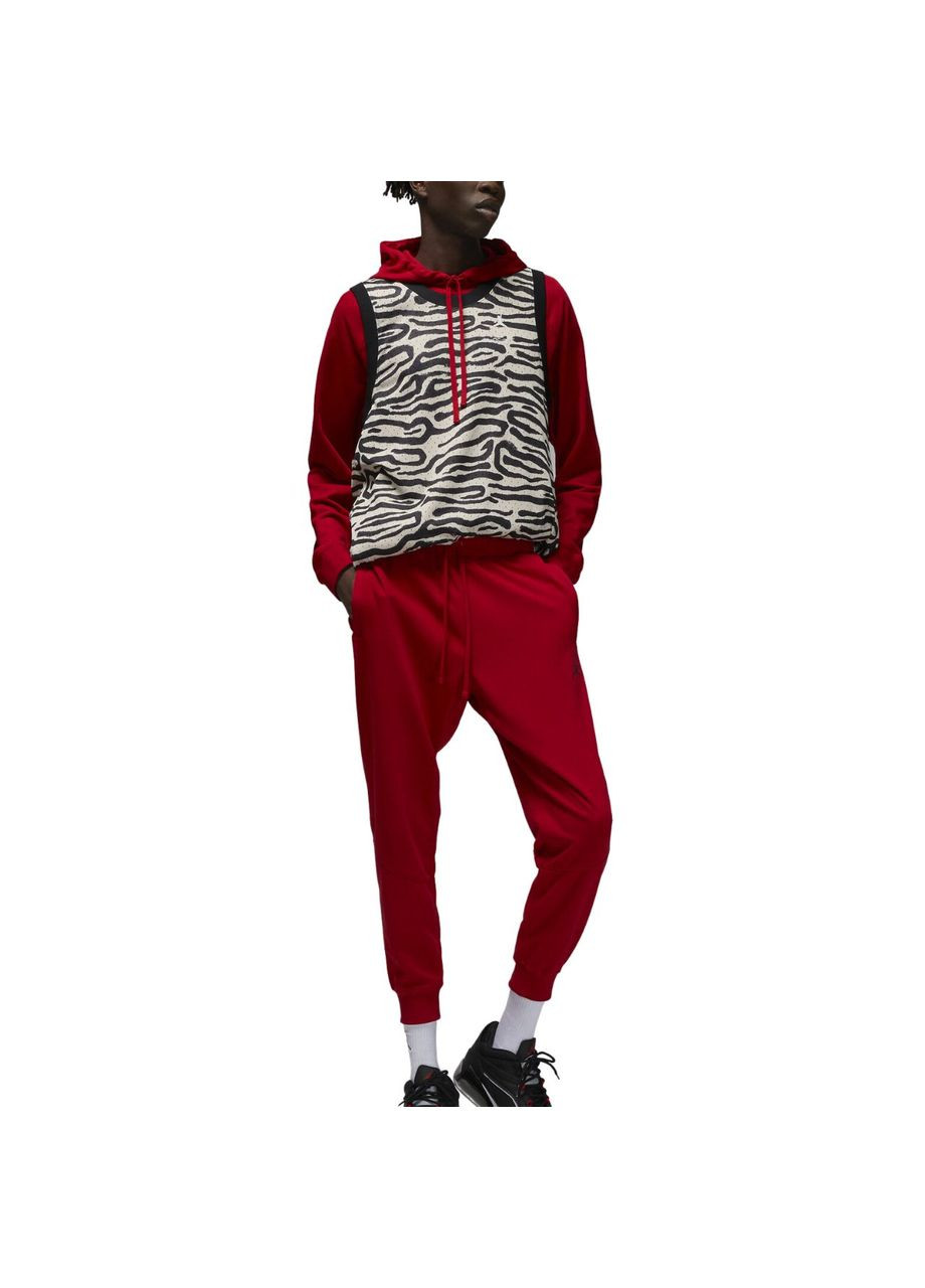 Красные демисезонные брюки Nike