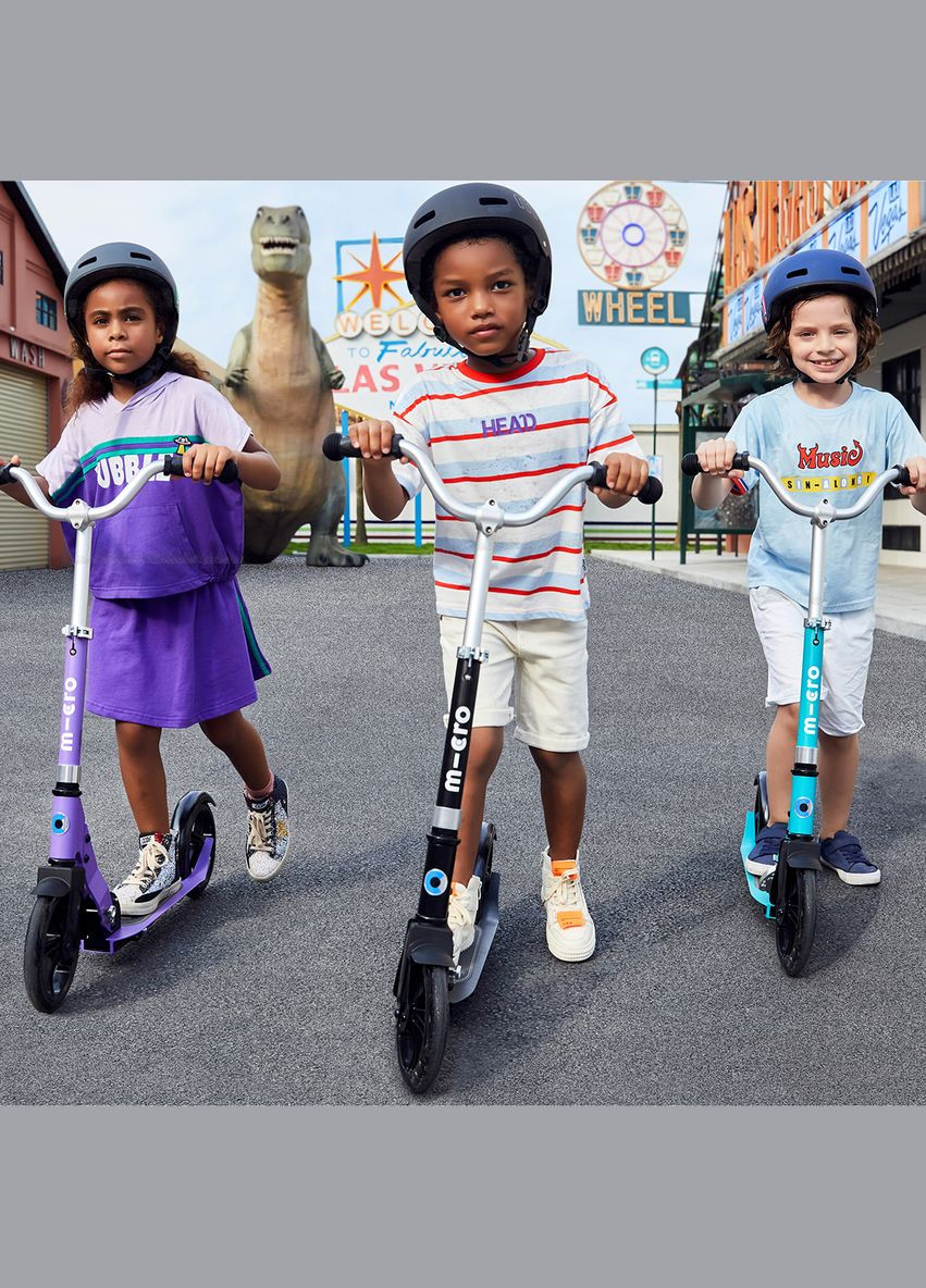 Захисний шолом з малюнком навушників, розмір M, зелений () Micro AC2111BX (333299135)