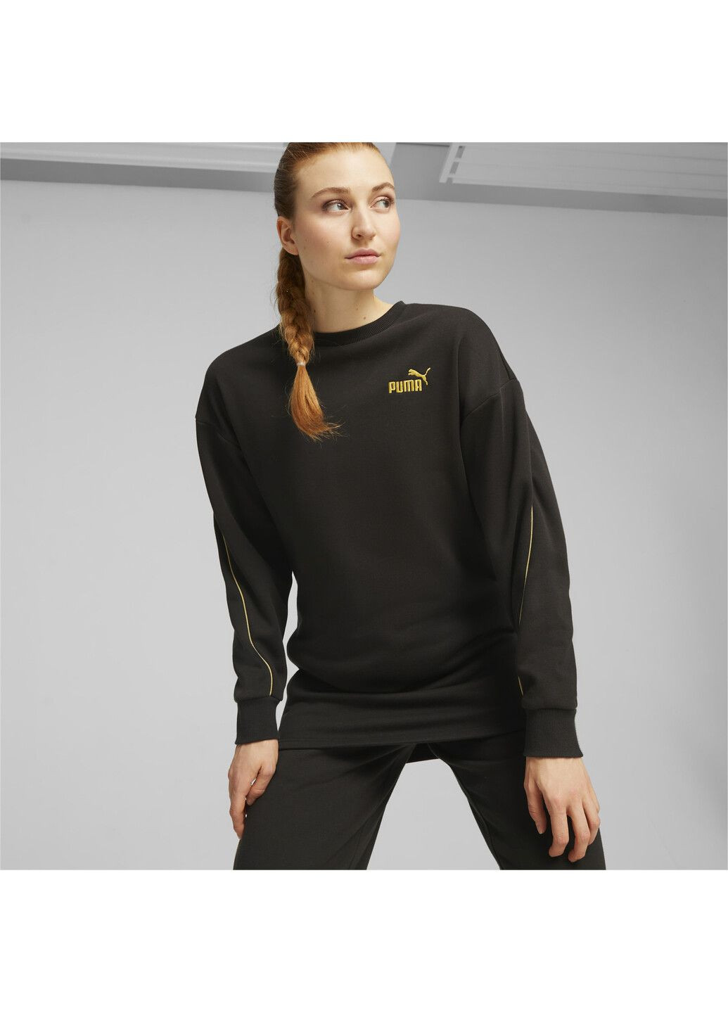 Черное спортивное платье ess+ minimal gold women's dress Puma однотонное
