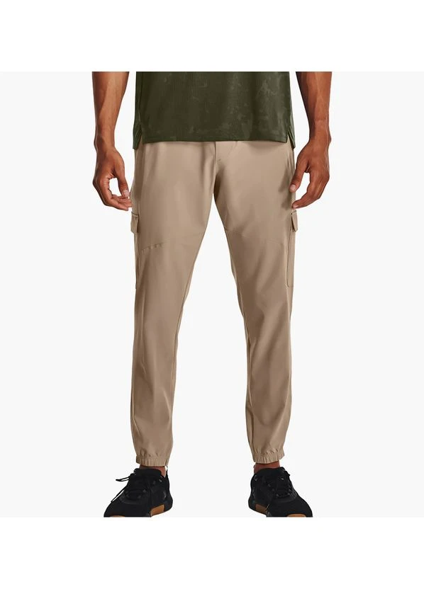 Бежевые демисезонные брюки Under Armour