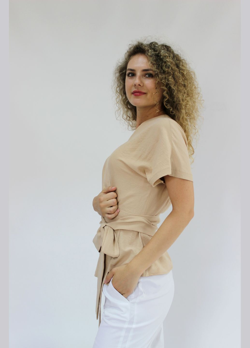 Бежевая блуза Парада