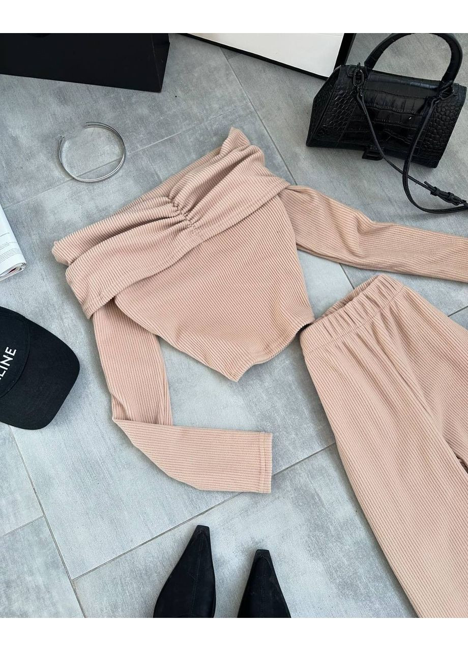 Жіночий костюм із топом та штанами палаццо Україна (361850157)