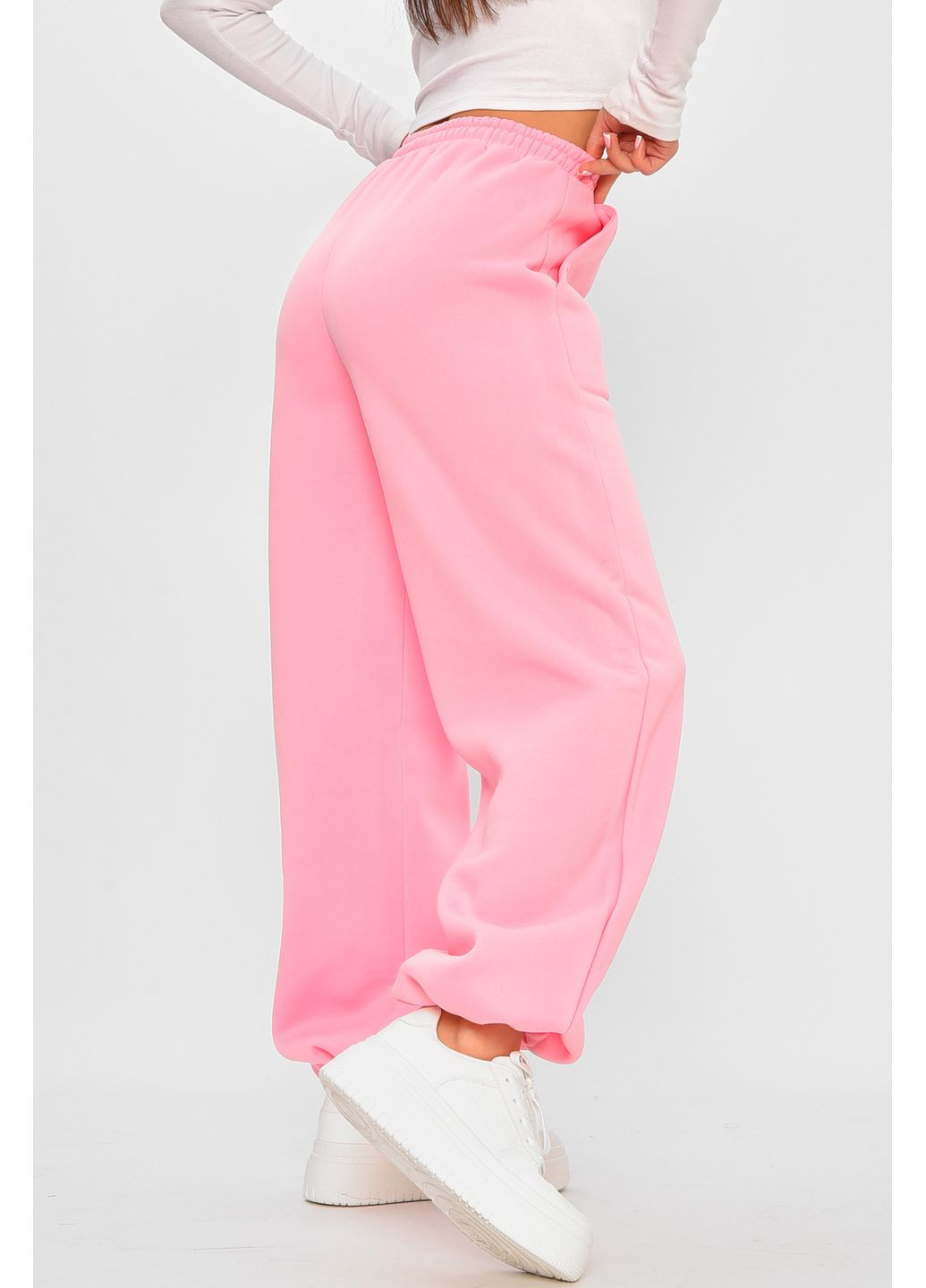 Спортивні штани жіночі на флісі рожевого кольору Let's Shop (364117541)