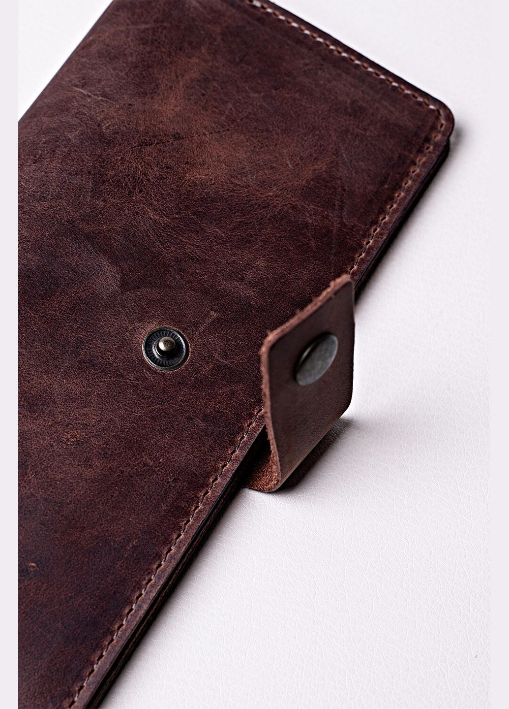 Унисекс кожаный кошелек "Крейзи" на кнопке коричневого цвета VOLMAS (316302469)