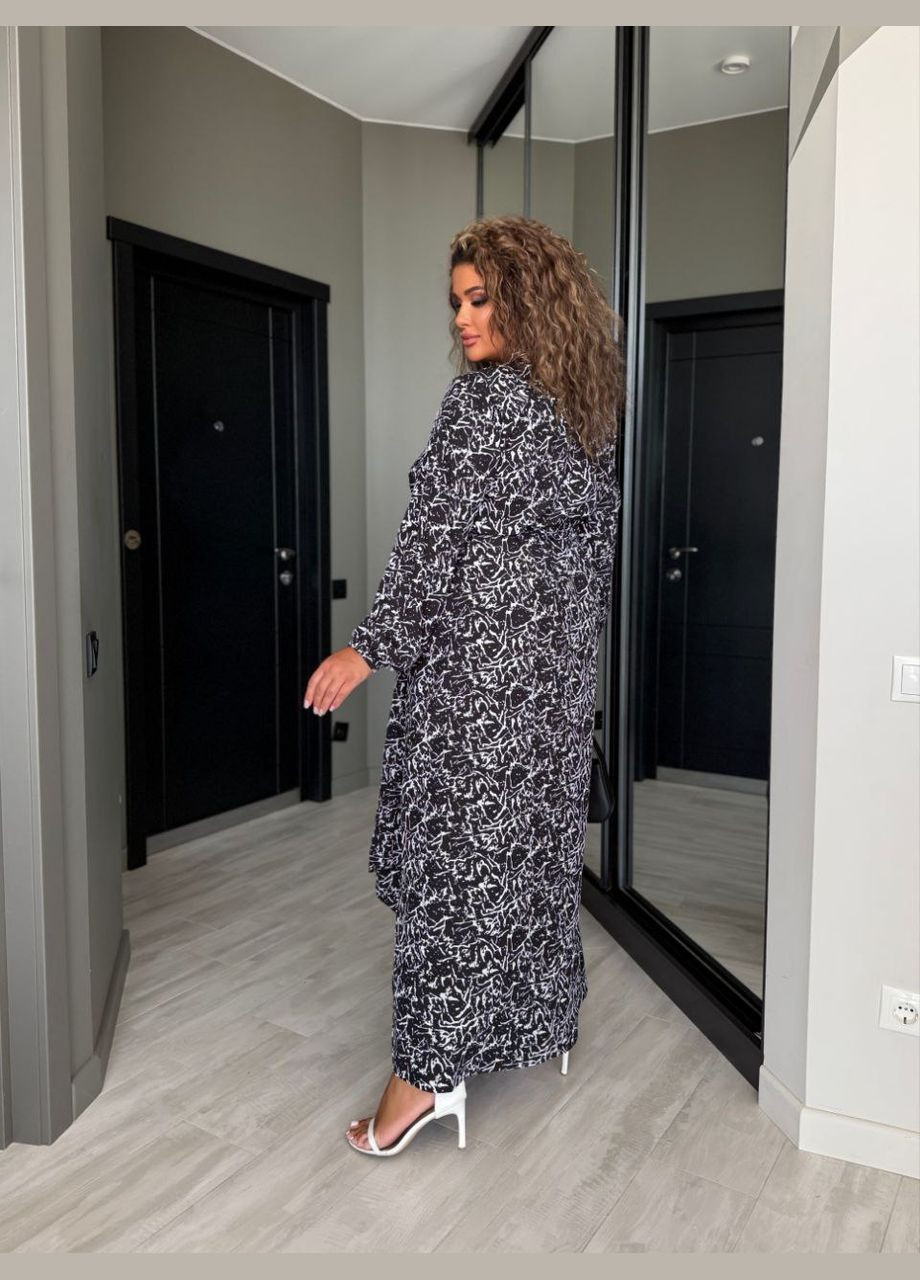 Чорна легка сукня міді чорного кольору 33799 а-силует Fashion з квітковим принтом