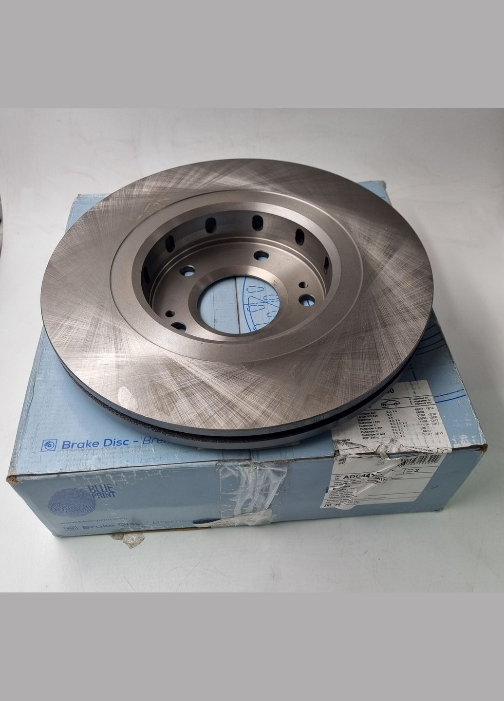 Диск гальмівний передній ADC44392 Аутлендер 4615A179, MR128659 Blue Print (345739317)