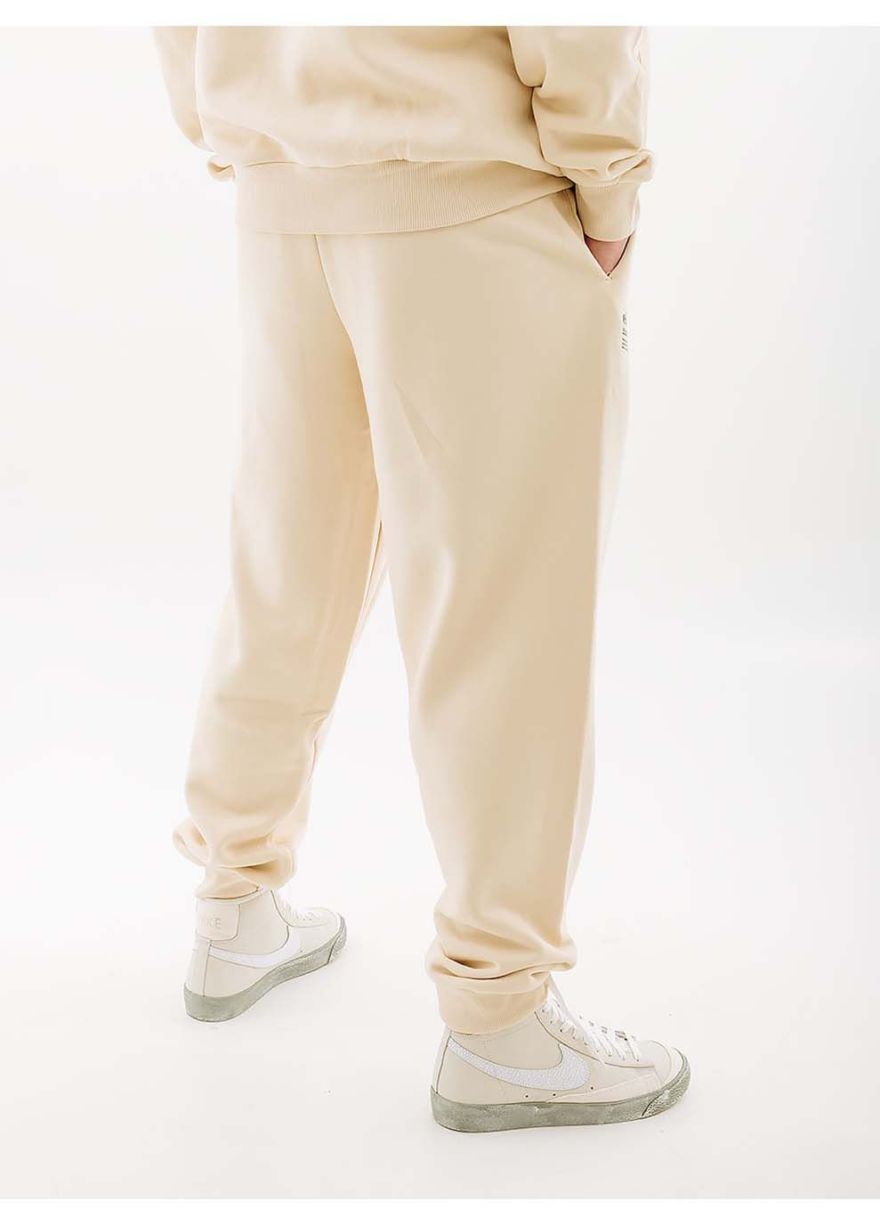 Бежевые демисезонные брюки Ellesse