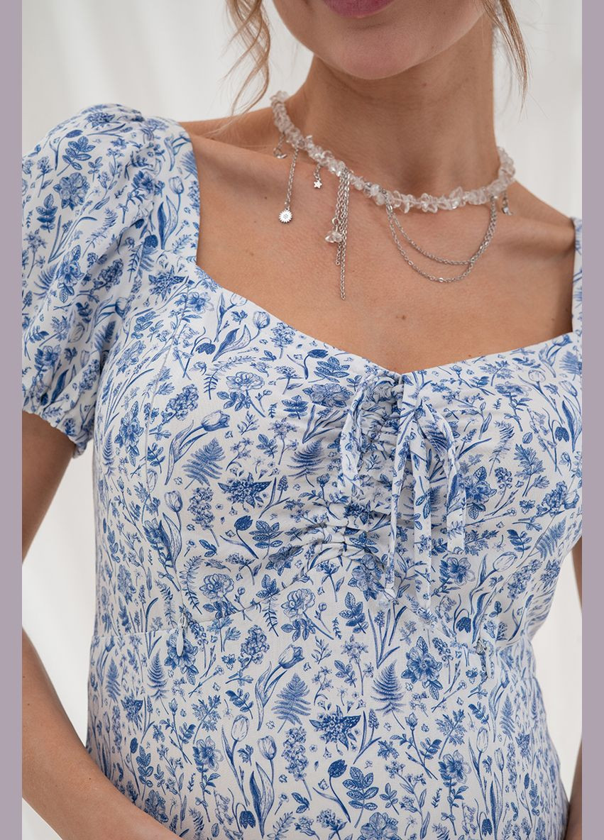 Білий вишукана сукня для вагітних та годуючих з секретом годування біло-синього кольору Юла мама з квітковим принтом