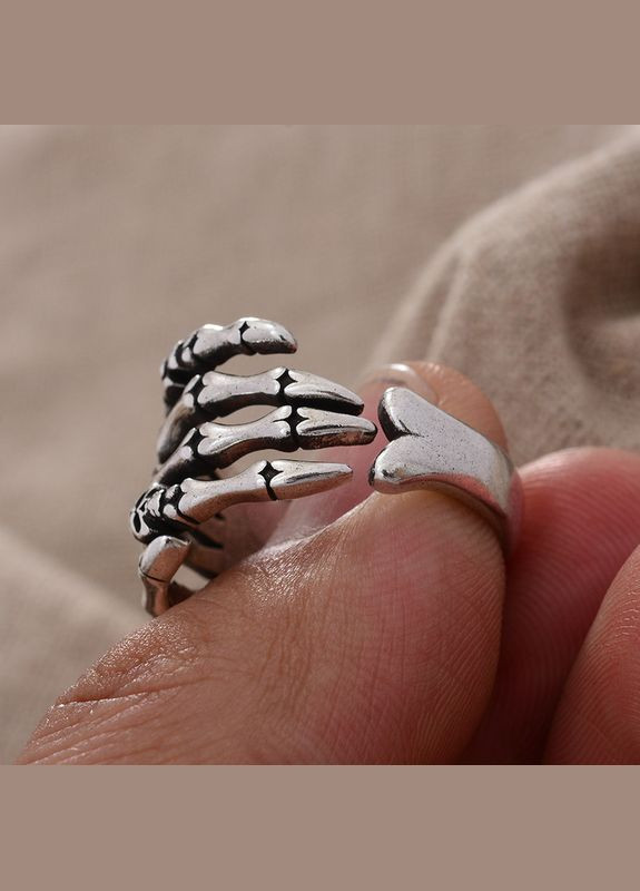 Чоловіче кільце з черепом і кістками з неіржавкої сталі, колір срібло, розмір регулюється No Brand (327874952)