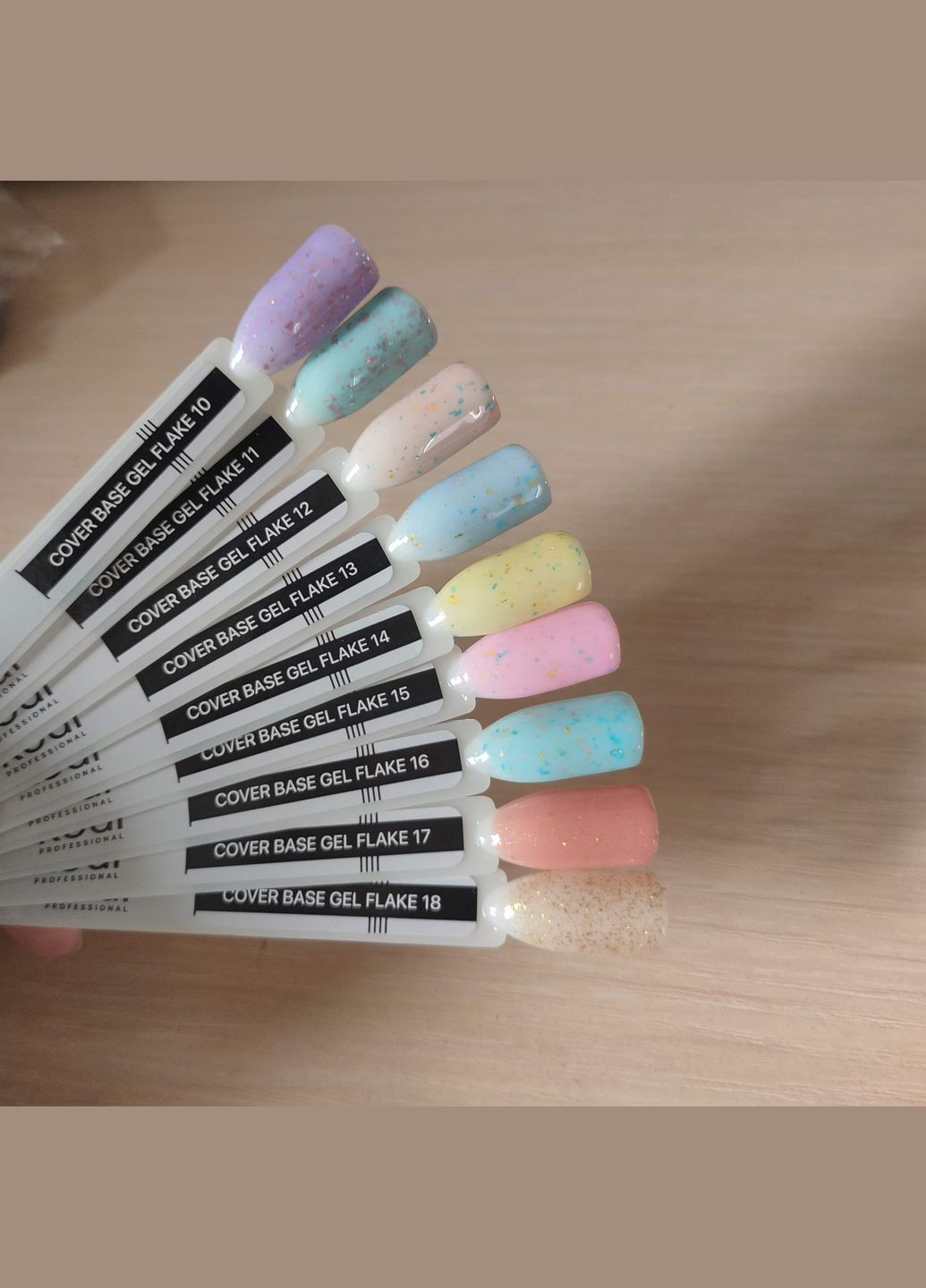 Камуфлююче базове покриття для нігтів Kodi Cover Base Flake №15 рожевий Kodi Professional 7 мл (316635513)