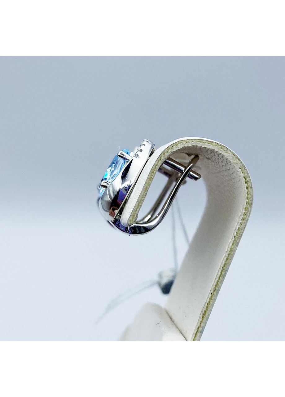 Сережки срібні з блакитним топазом і кубічним цирконієм 4,55 г No Brand (369737622)