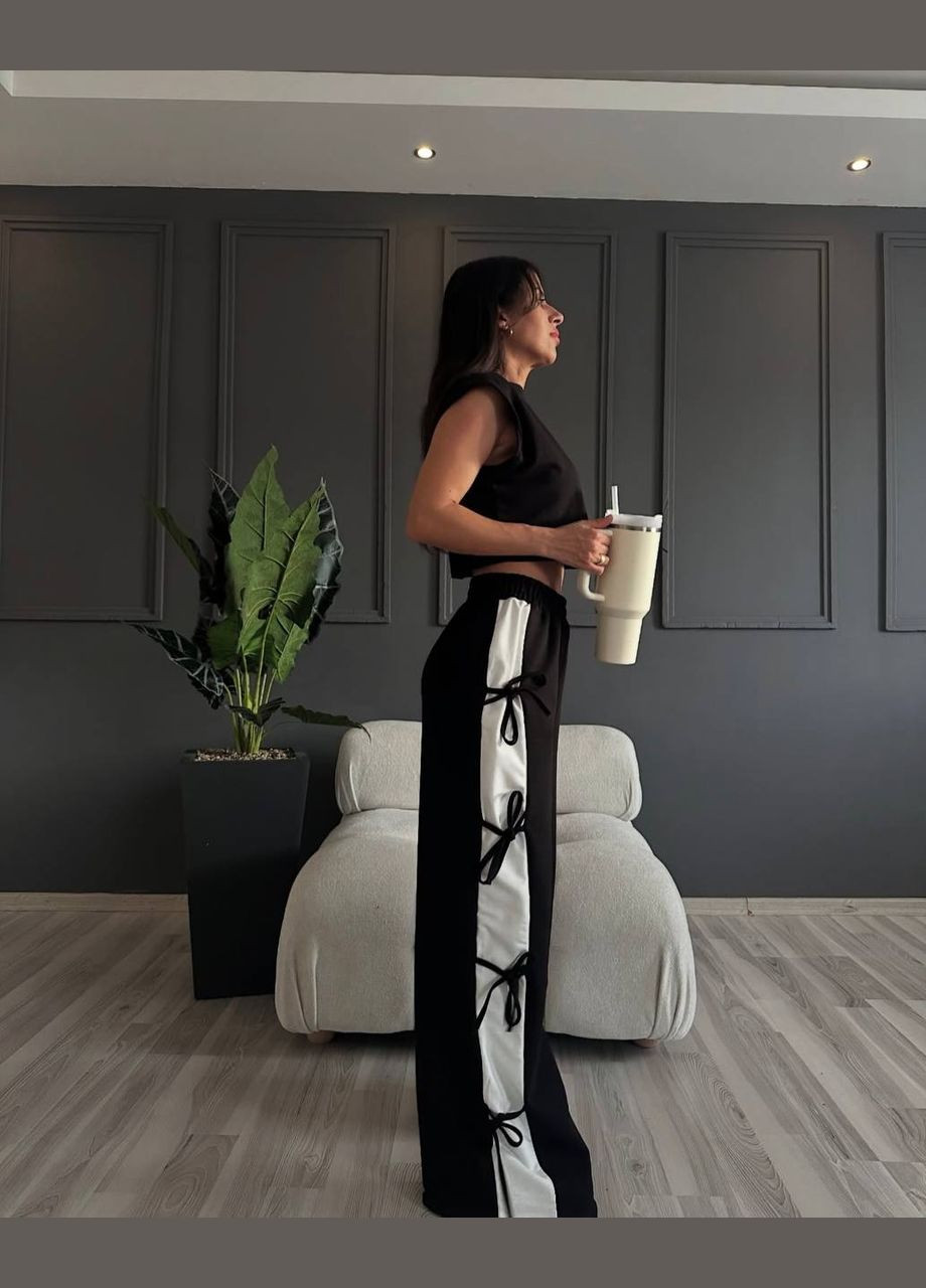 Обьемные женские штаны с лампасами Nositi (327738454)