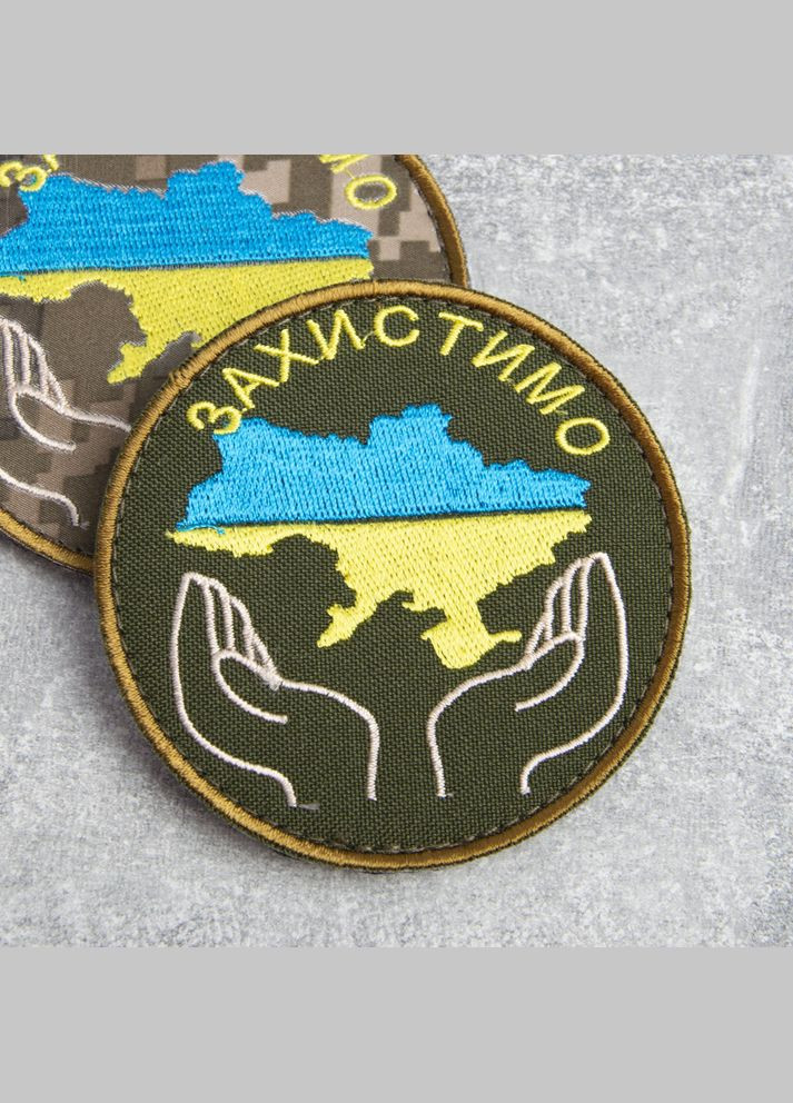 Шеврон на липучке Захистимо Україну 8 см хакі IDEIA (275869810)