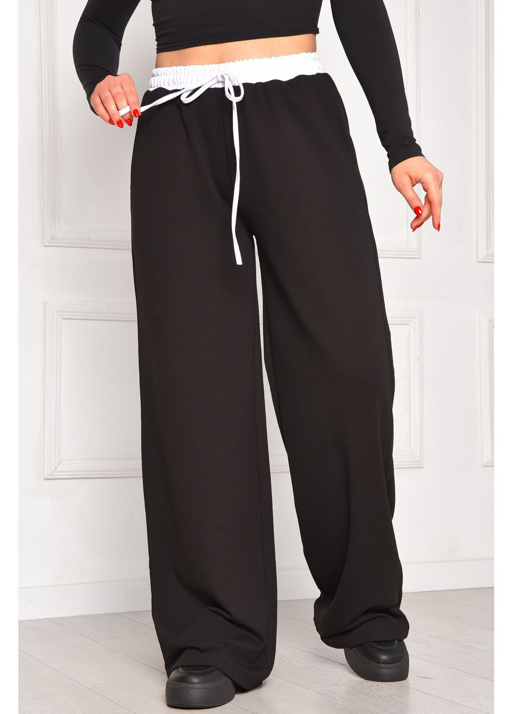 Спортивні штани жіночі однотонні чорного кольору Let's Shop (369445350)