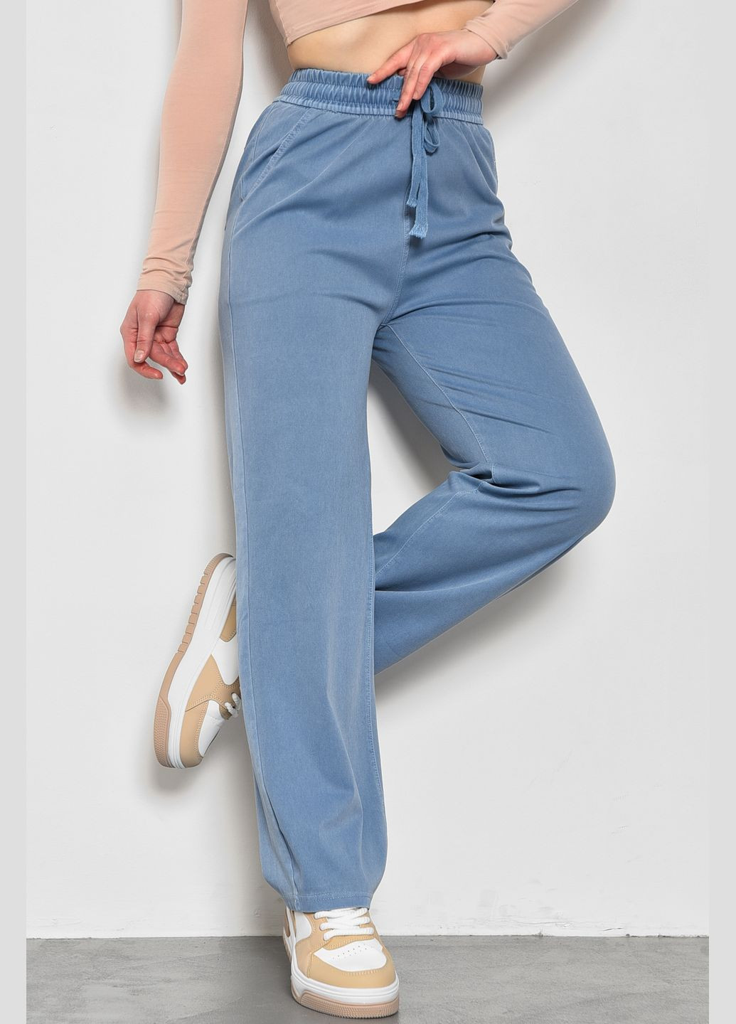 Штани жіночі розкльошені напівбатальні блакитного кольору Let's Shop (278274357)
