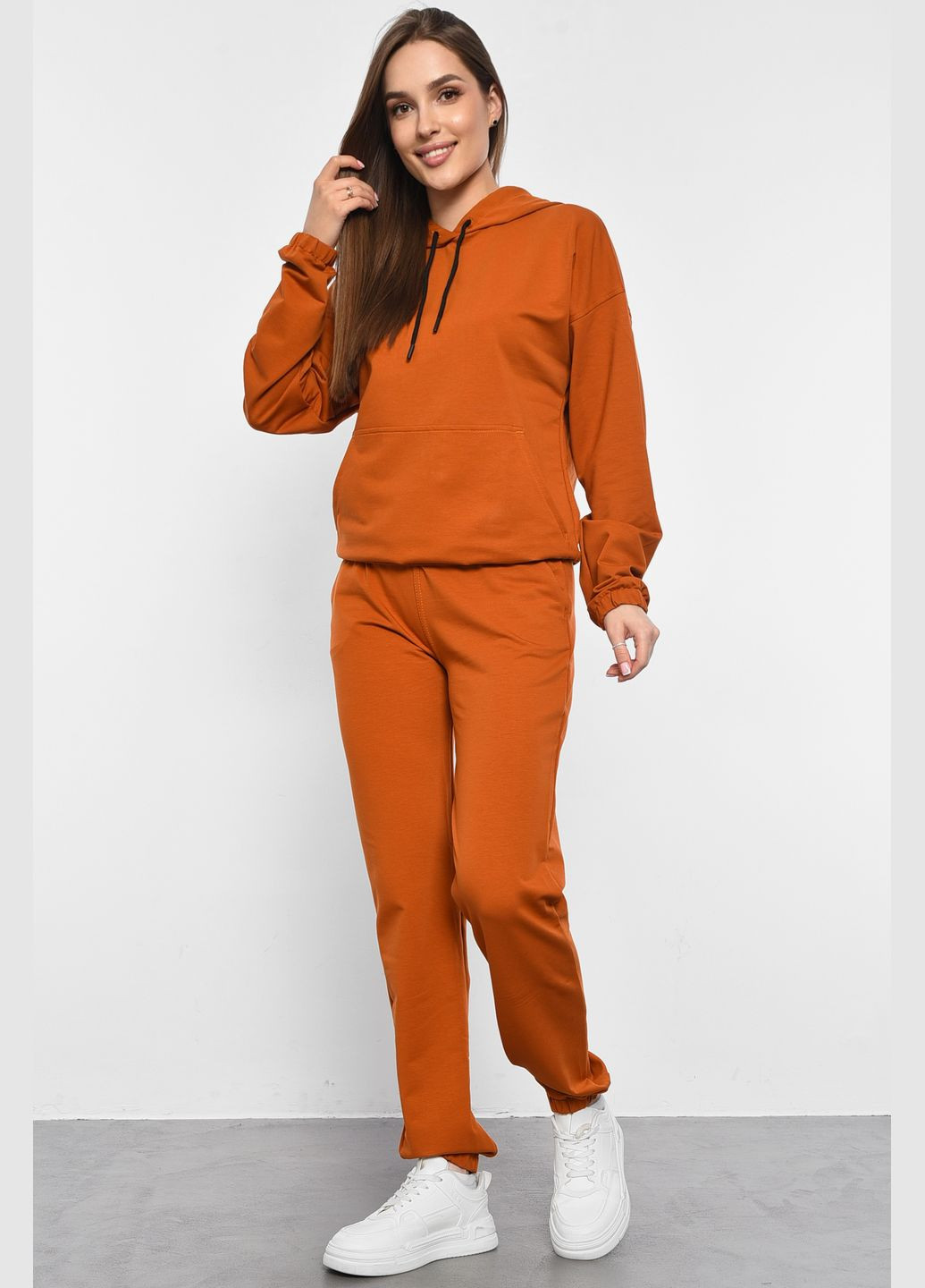 Спортивний костюм жіночий помаранчевого кольору Let's Shop (292755084)