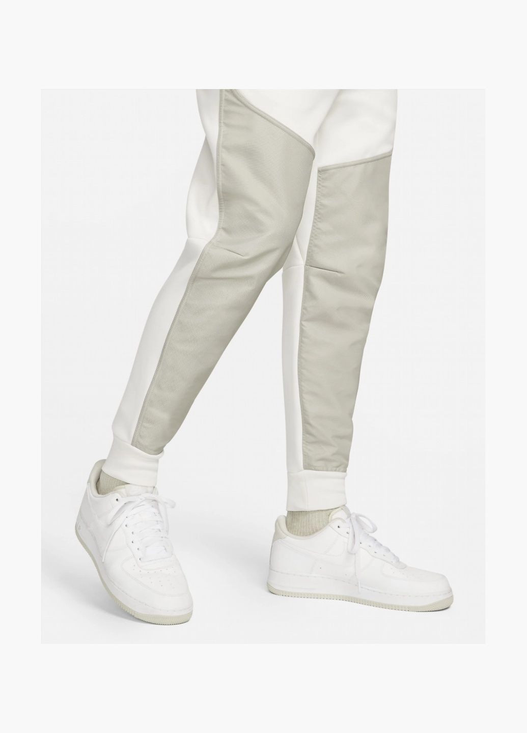 Белые демисезонные брюки Nike