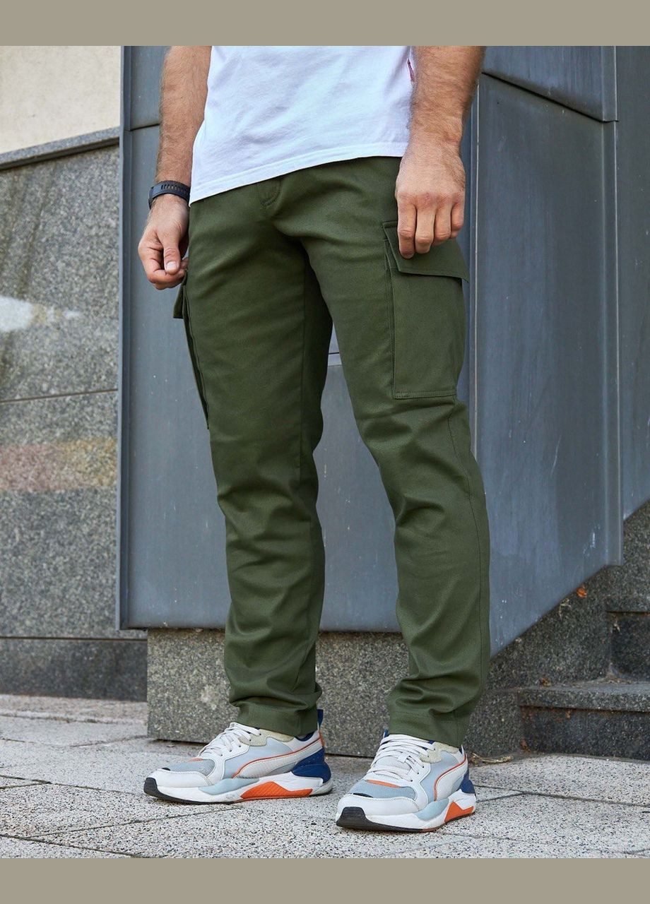 Зеленые демисезонные брюки Olymp