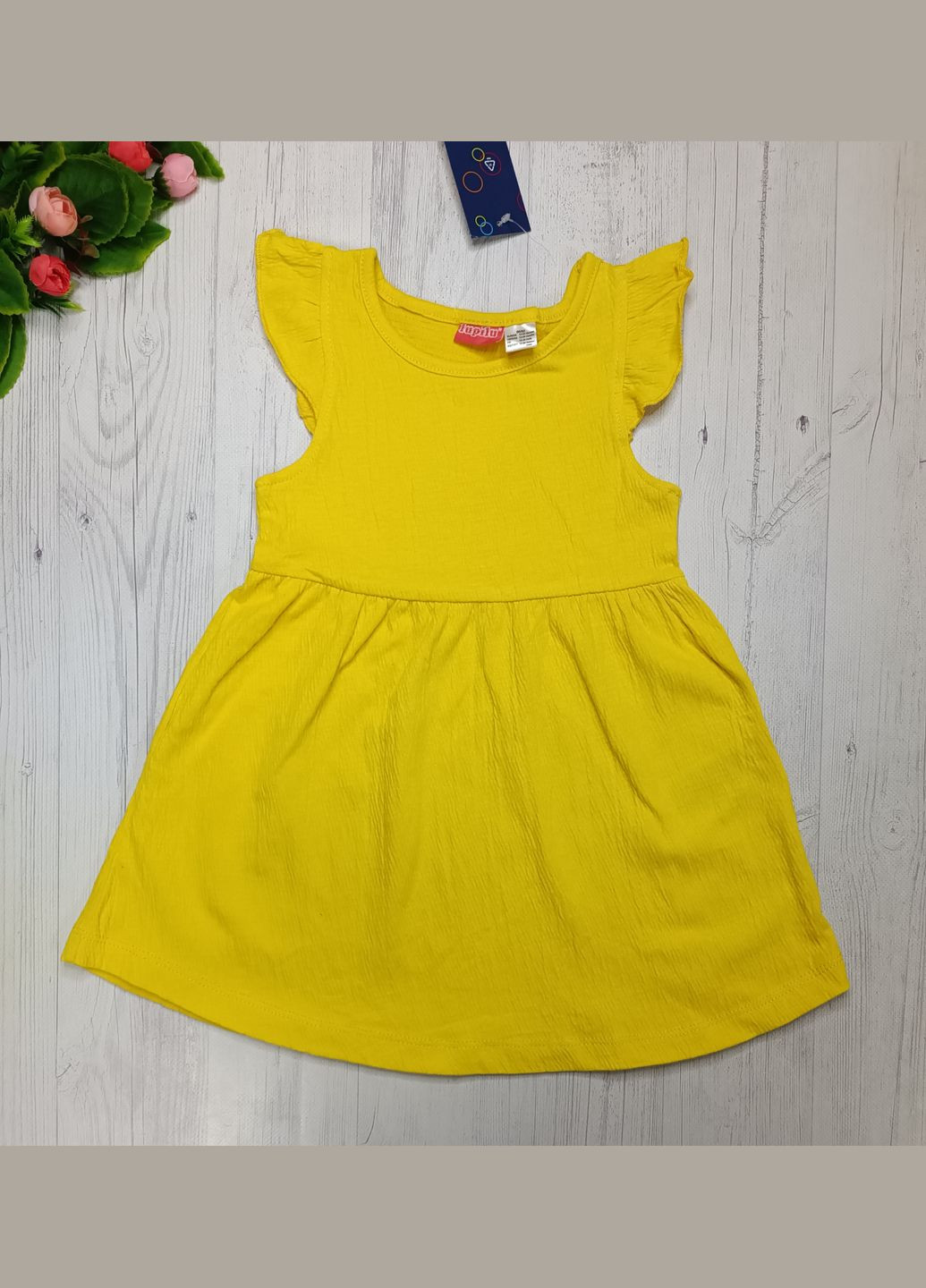 Жовта сукня для дівчинки Lupilu (292732175)