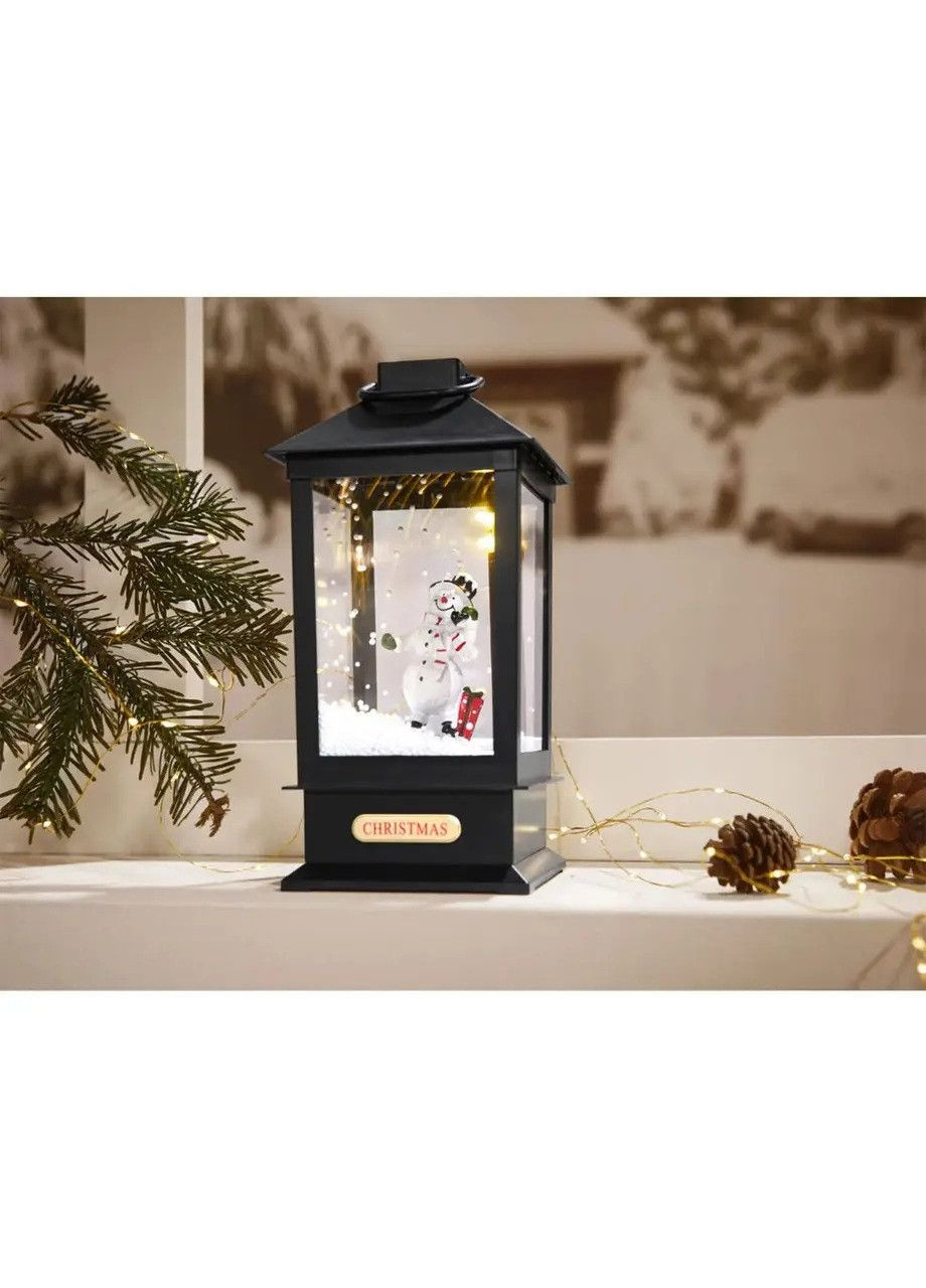 Новорічний ліхтар Сніговик з музикою і снігом 30 см Livarno home (362045991)