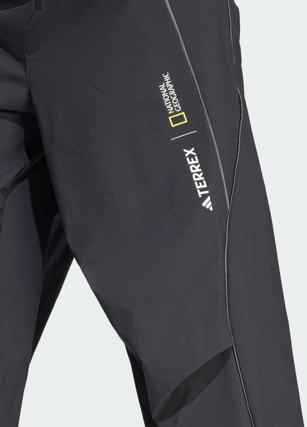 Спортивні штани Nat Geo AEROREADY Woven adidas (342394697)