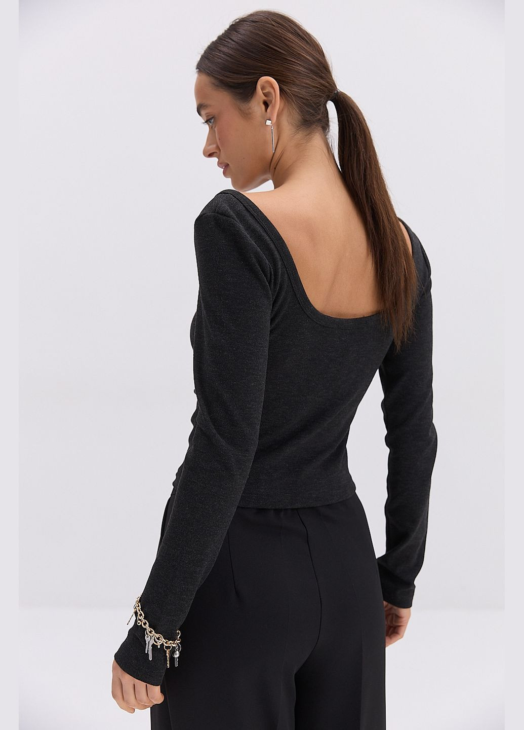 Женская трикотажная кофточка черная с драпировкой спереди Arjen (317233827)