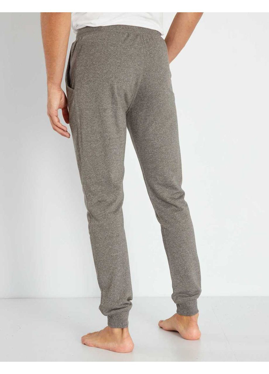 Серые брюки Kiabi