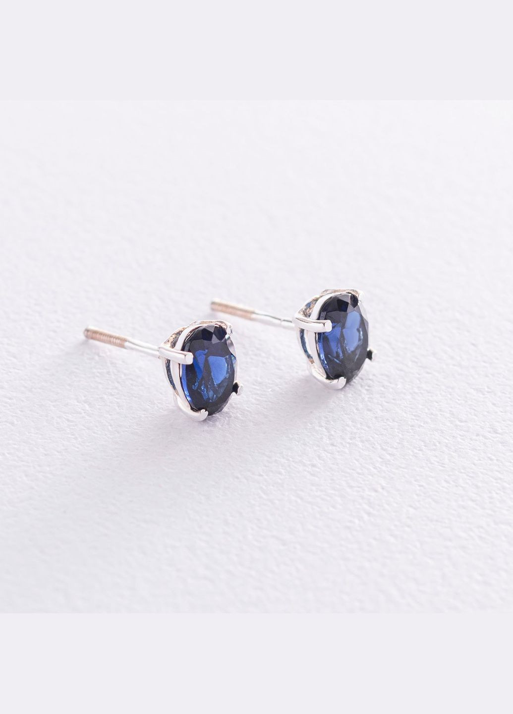 Срібні сережки-пусети з синт. сапфіром нано 6х8 121968 Oniks (264393001)