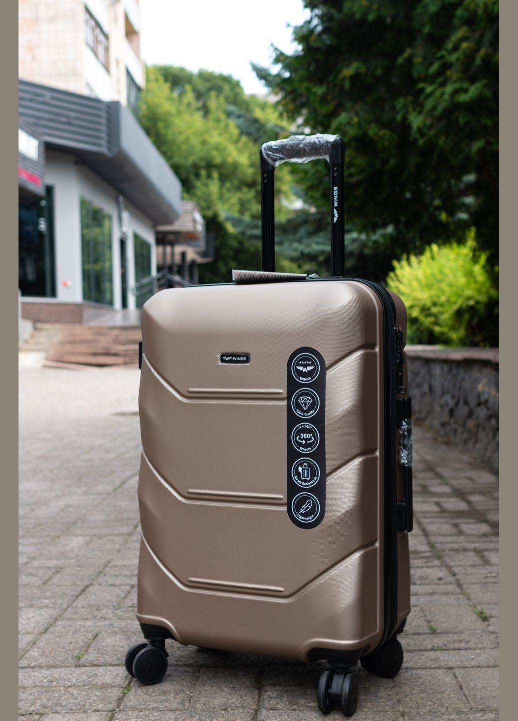 Валіза пластикова середня M з розширенням, колір шампань Wings 149 (347147034)