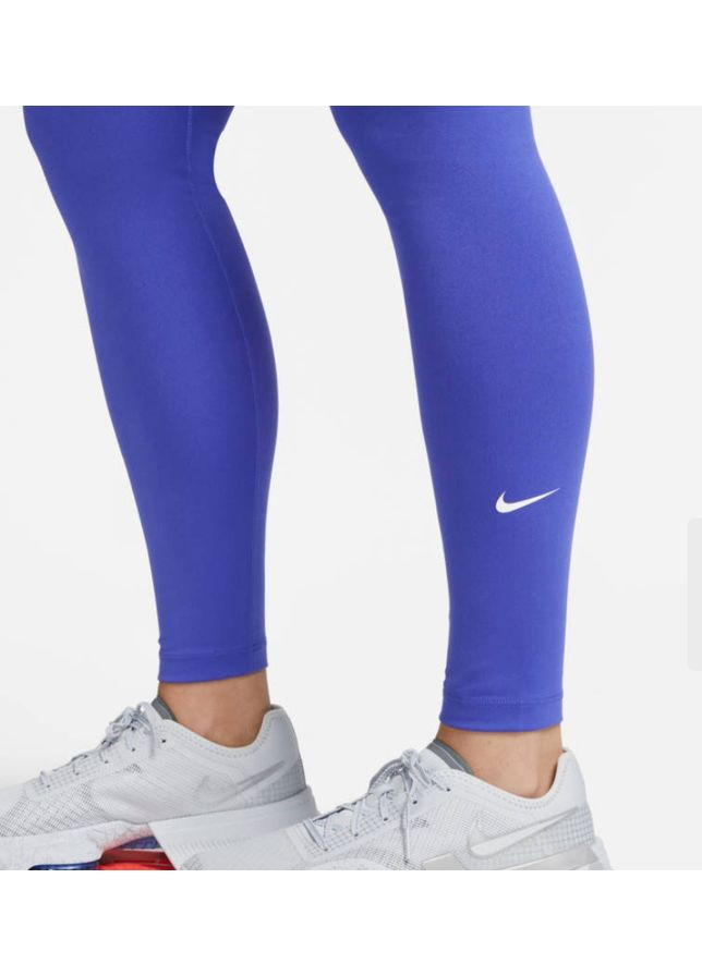 Фиолетовые демисезонные спортивные лосины Nike