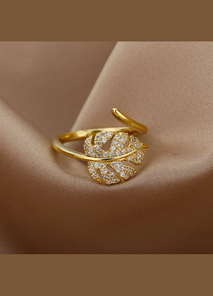 Каблучка жіноча золотиста у формі пальмового листа вкрита білими фіанітами р регульований Fashion Jewelry (285814501)