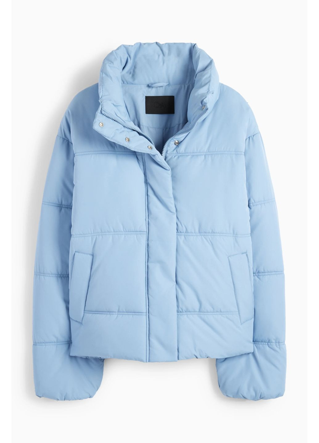 Блакитна демісезонна стеганна куртка C&A