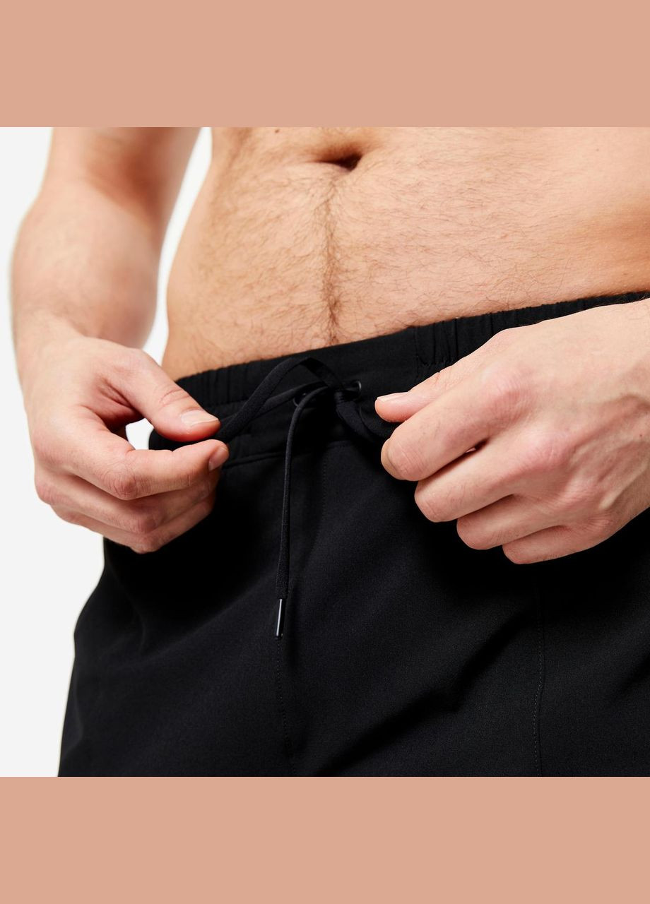 Черные демисезонные брюки Domyos