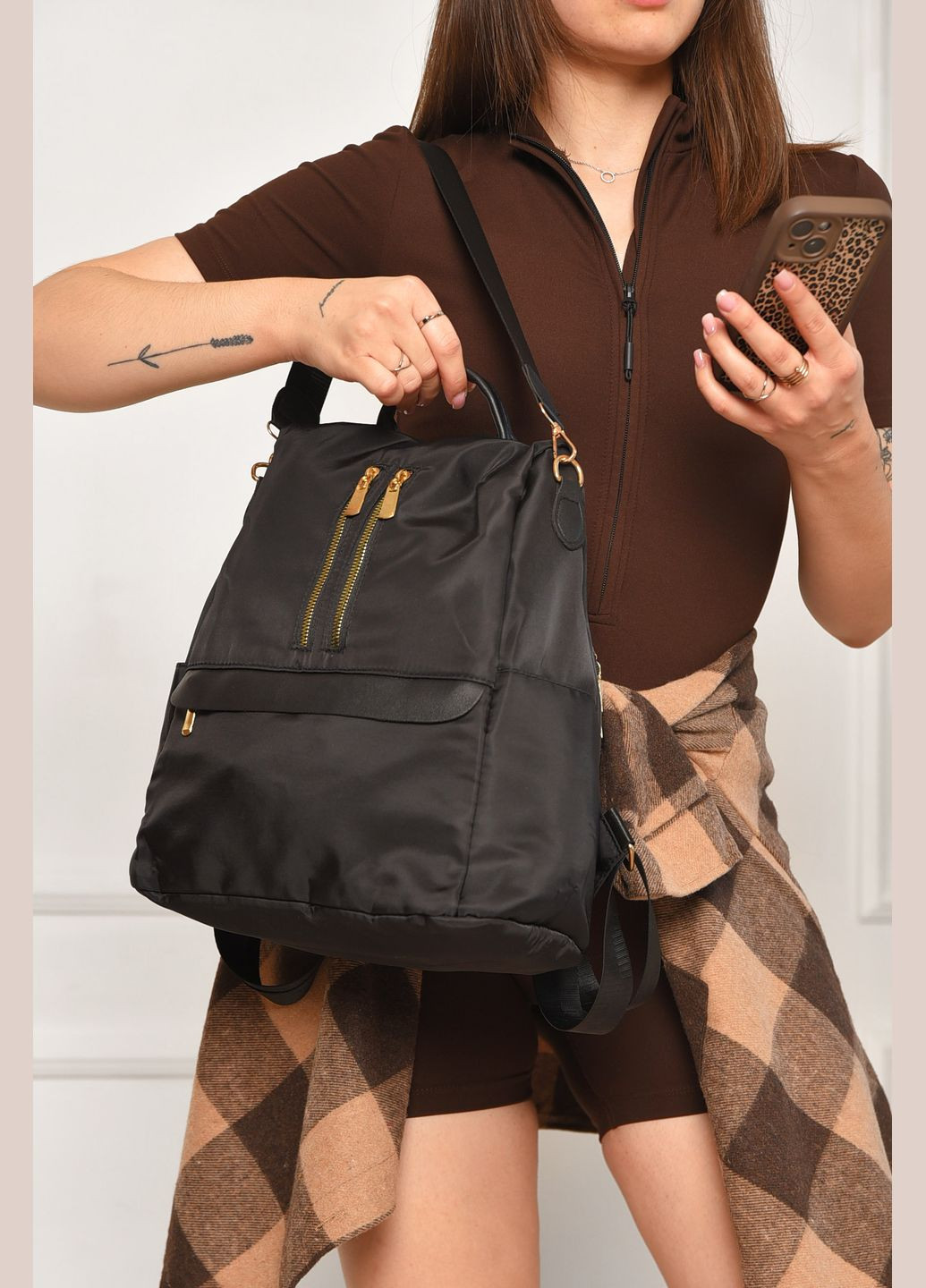 Рюкзак жіночий однотонний чорного кольору Let's Shop (346815503)