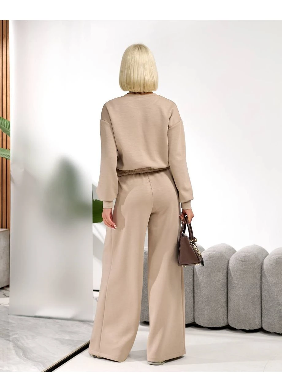 Жіночий прогулянковий костюм бежевого кольору 36913 Fashion (381018100)