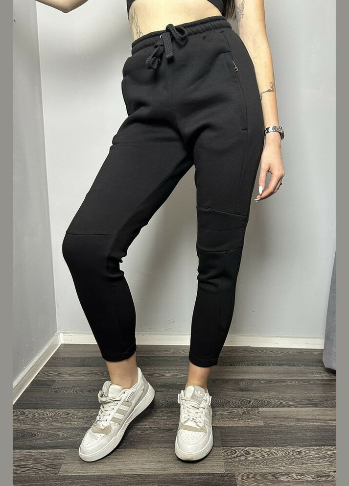 Жіночі штани трикотажні завужені чорні MKKS310823-1 Modna KAZKA (336932078)