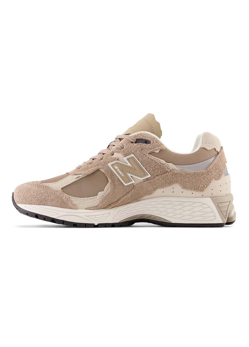 Бежевые демисезонные мужские кроссовки 2002r m2002rdl бежевый New Balance