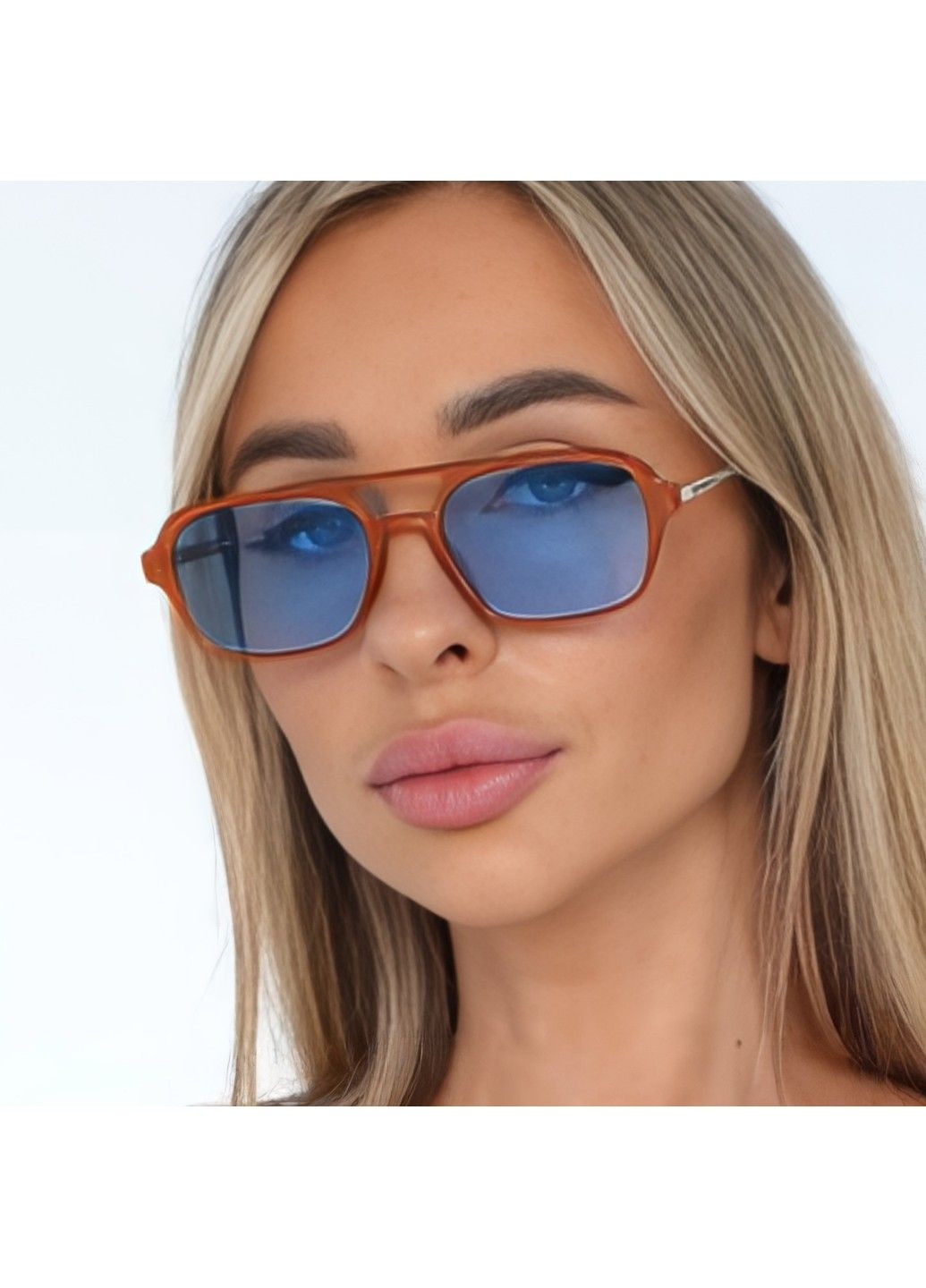 Сонцезахисні окуляри авіатор Celebrity з металевим завушником блакитні з помаранчевим No Brand (325889070)