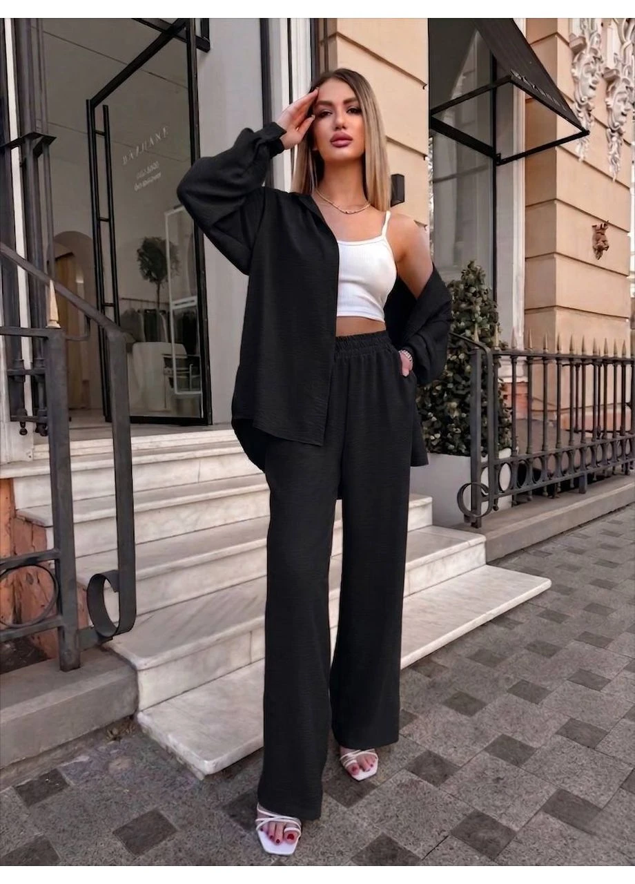 Костюм жіночий прогулянковий сорочка+штани чорного кольору 38539 Fashion (396634345)