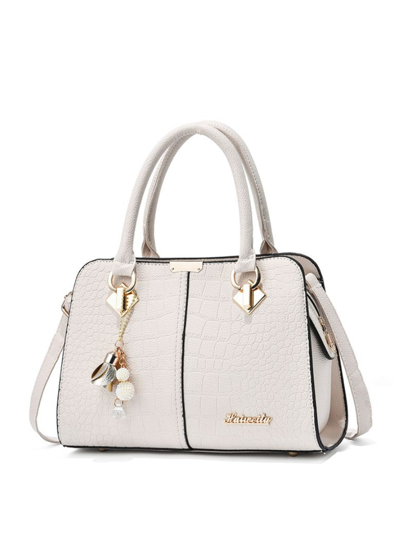 Жіноча сумка класична трапецієподібна з екошкіри з брелком зміїний принт молочний (sku_1458М) No Brand (330576155)