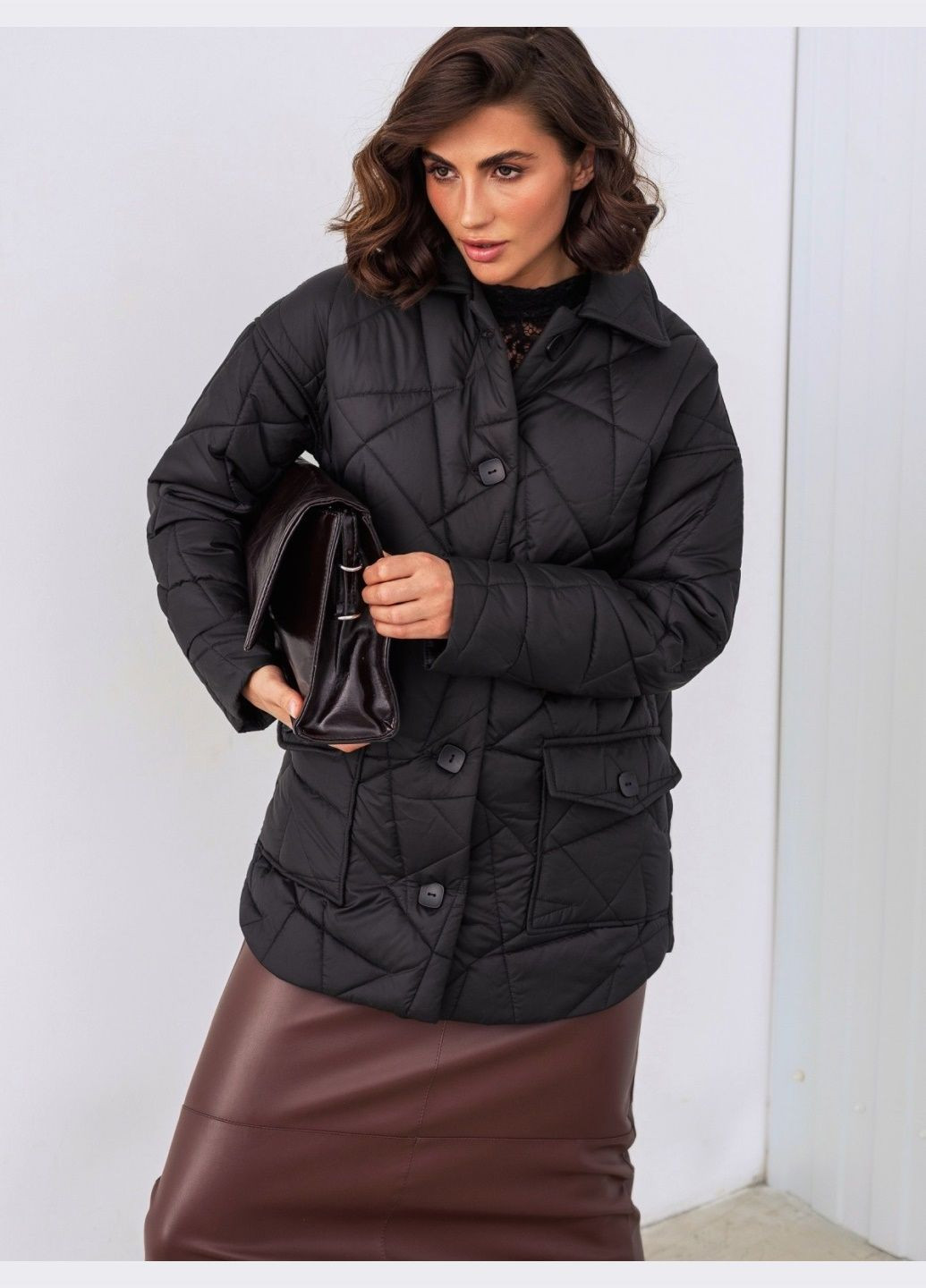 Чорна демісезонна стьобана демісезонна куртка на ґудзиках чорна Dressa