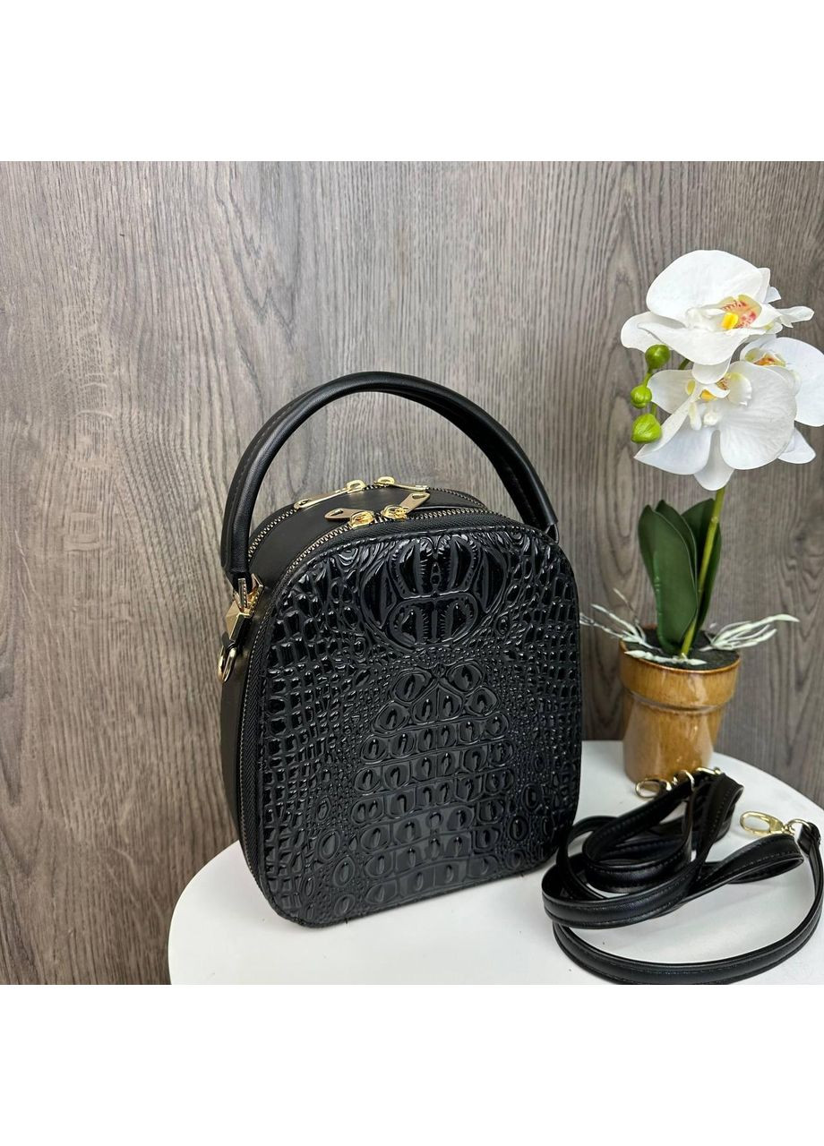 Модная женская сумочка рептилия черная эко кожа на плечо полукруглая лаковая ProDobro (363259332)